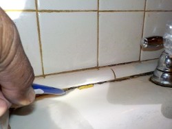 Missing Grout and Cracked Tiles
